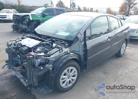 2021 Toyota Prius Le from USA, damaged, VIN JTDKAMFU1M3142837